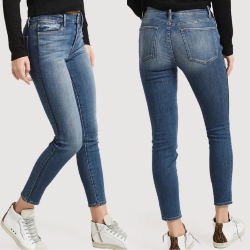 Frame Le High Skinny Jean with black piping along seam, size 26, worn gently.